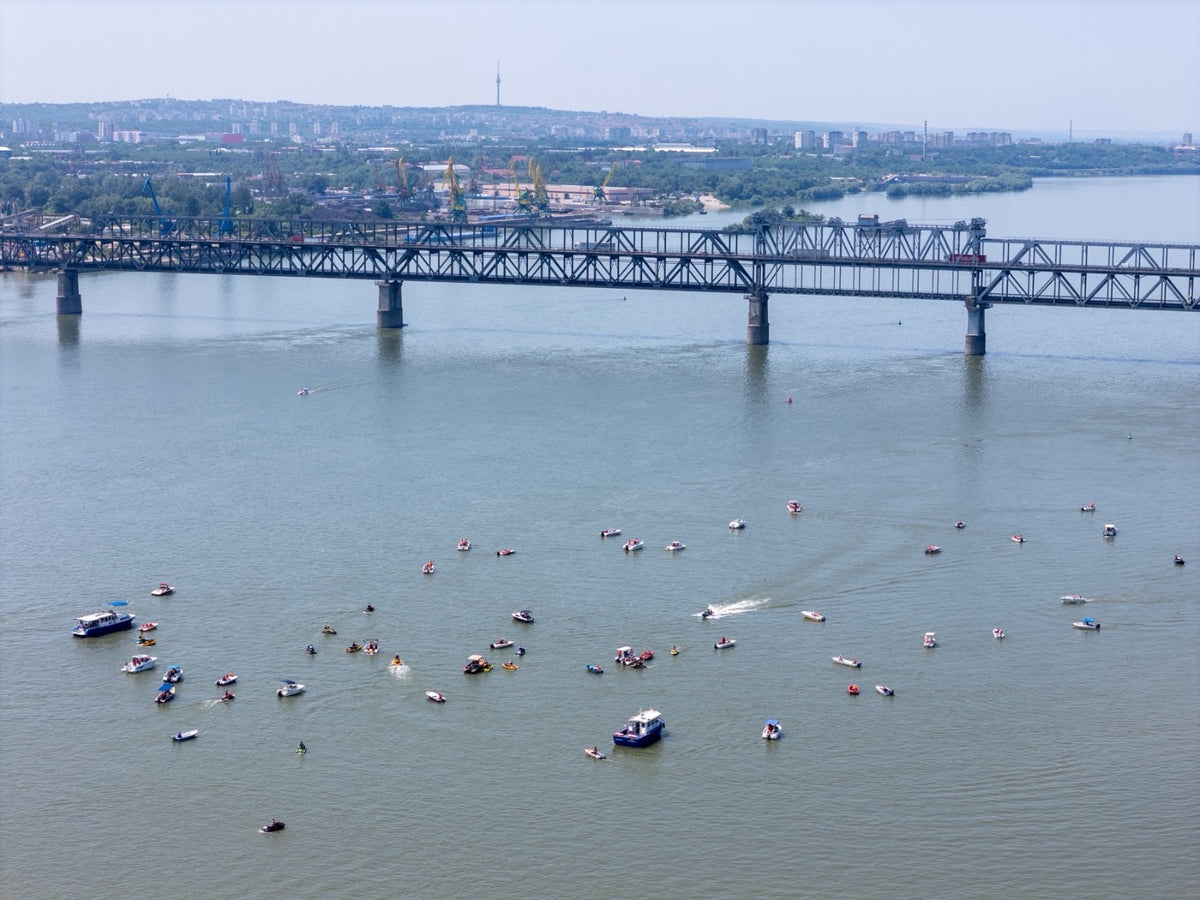 "Danube Parade - two flags, one river"
