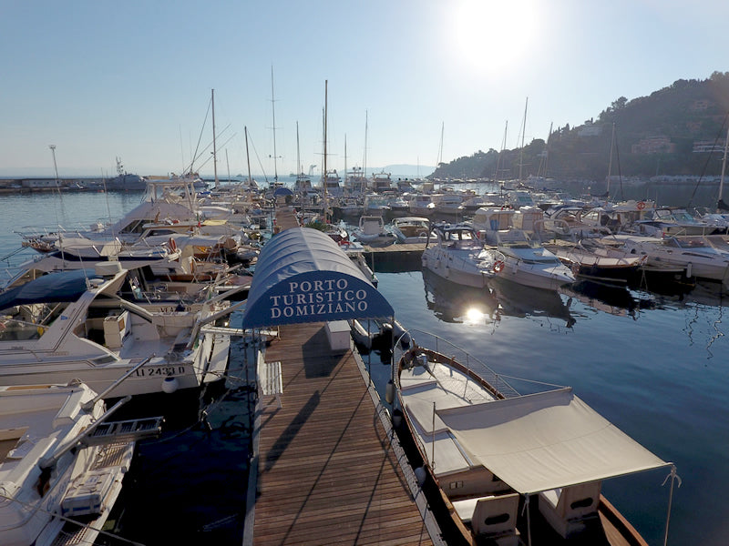Marina with docked boats with Eberths.com at Porto Turistico Domiziano